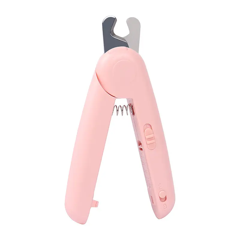 Pink pet nail clipper with LED light and spring-loaded design on white background.