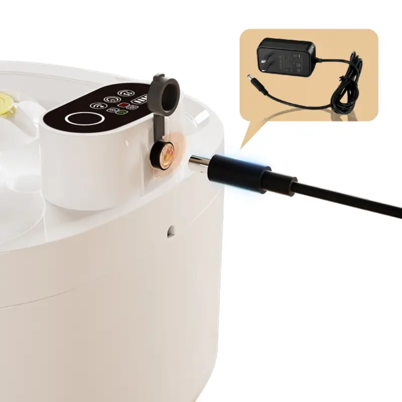 White pet water fountain with charging port and power adapter, back view.