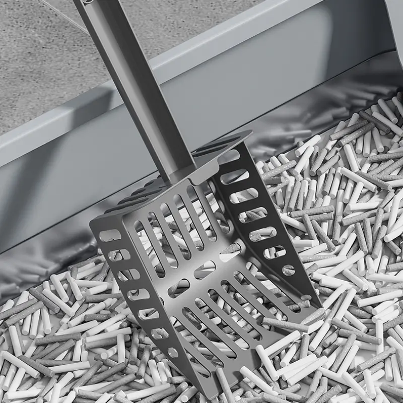 Durable metal cat litter scoop paired with stainless steel litter box for efficient cleaning.
