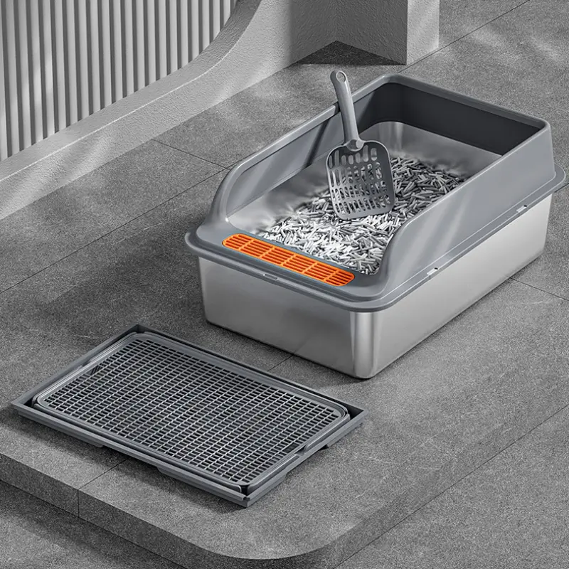 Two-tone stainless steel cat litter box set with litter mat and scoop, complete mess control.