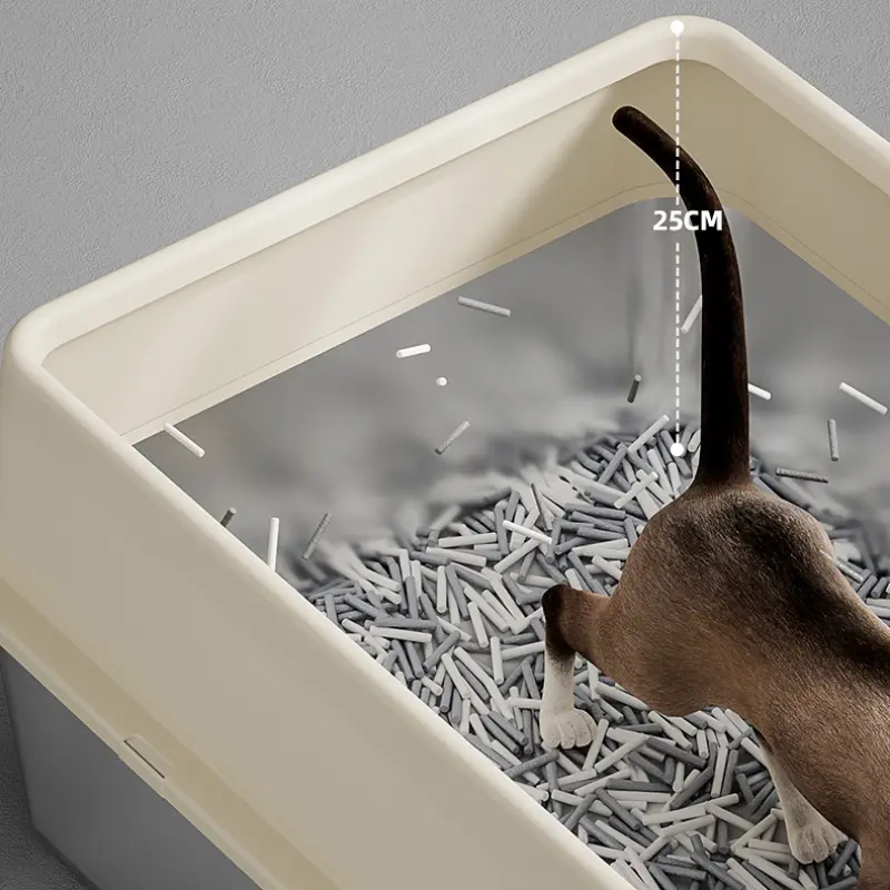 Stainless steel cat litter box with 25cm depth, cat using it, high sides for mess control.