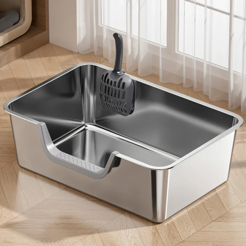 Waterproof stainless steel cat litter box with low entry, shown with water droplets to highlight easy cleaning